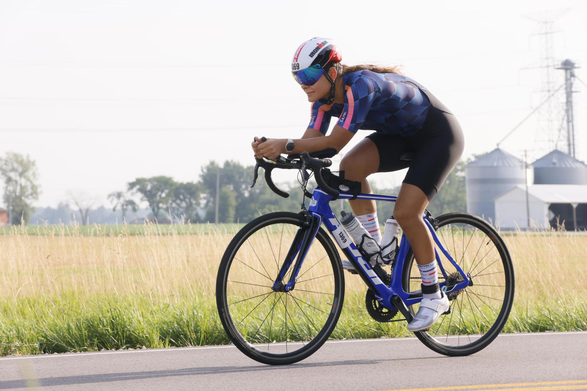 Placeholder listing photo of a road bike on an open road.